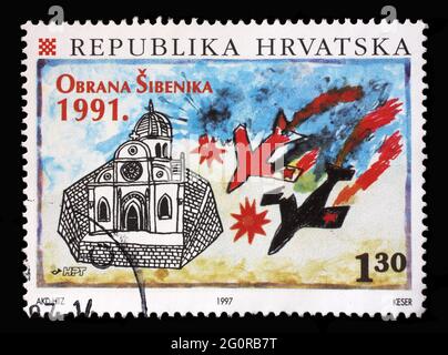A stamp printed in Croatia shows Air Attack on Sibenik, 1991, Defense of Sibenik in the Homeland War, circa 1997 Stock Photo