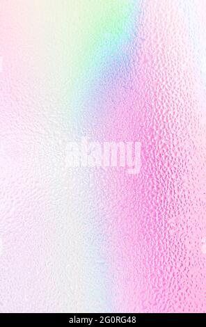 A holographic gradient background of rainbow color. Vertical rainbow color background. High quality photo Stock Photo