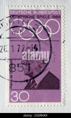 Stamp printed in Germany showing portrait of Pierre de Coubertin, 1968 Summer Olympics, the Games of the XIX Olympiad, Mexico City, circa 1968 Stock Photo