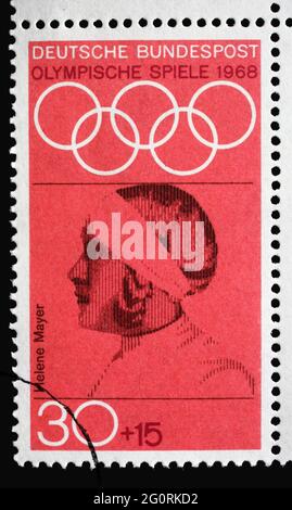 Stamp printed in Germany showing portrait of Helene Mayer, fencer, 1968 Summer Olympics, the Games of the XIX Olympiad, Mexico City, circa 1968 Stock Photo