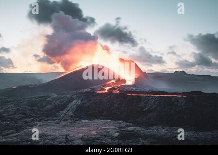 MAY 2021: The broader Fagradalsfjall volcanic system comprises an area of eruptive fissures (fissure swarm), cones and lava fields in the southern part of the Reykjanes peninsula. A strong seismic crisis began in the area near Fagradalsfjall since late Feb 2021, interpreted as intrusion of magma at shallow depth. This led to the first historic eruption of the volcano on 19 March 2021. Stock Photo