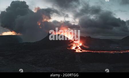 MAY 2021: The broader Fagradalsfjall volcanic system comprises an area of eruptive fissures (fissure swarm), cones and lava fields in the southern part of the Reykjanes peninsula. A strong seismic crisis began in the area near Fagradalsfjall since late Feb 2021, interpreted as intrusion of magma at shallow depth. This led to the first historic eruption of the volcano on 19 March 2021. Stock Photo