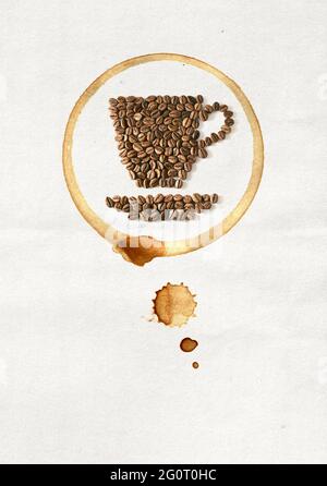 Cup of coffee made from coffee beans on white paper Stock Photo