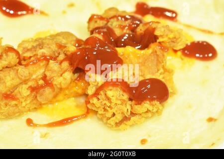 Stuffed Roti Chicken roti stuffed crispy fried chicken dressing ketchup and mustard sauce on ...
