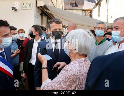 President Emmanuel Macron greets locals during a walkabout in Martel, southern France, on June 3, 2021. Macron is on a two-day visit in the Lot region to promote French touristical heritage and to highlight the importance of tourism, which has been hardly hit by the pandemic, ahead of the summer holidays. Photo by Patrick Bernard/Pool/ABACAPRESS.COM Stock Photo