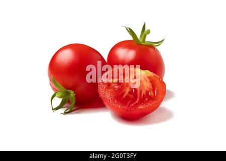 Several ripe cherry tomatoes isolated on white background Stock Photo