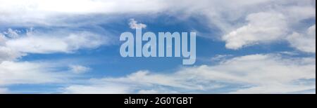 Panorama of blue sky with blurred clouds floating in the sky. Stock Photo