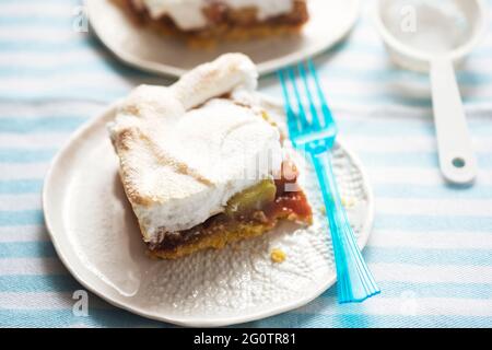 Rhubarb shortcrust cake with meringue on top Stock Photo
