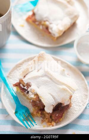 Rhubarb shortcrust cake with meringue on top Stock Photo