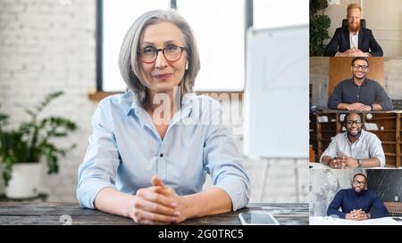 Online business training concept. A group of diverse skilled employee involved virtual meeting with confident female business coach. Video call, online conference with colleagues or workteam distantly Stock Photo