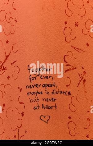 Poem and orange colored wallpaper Stock Photo