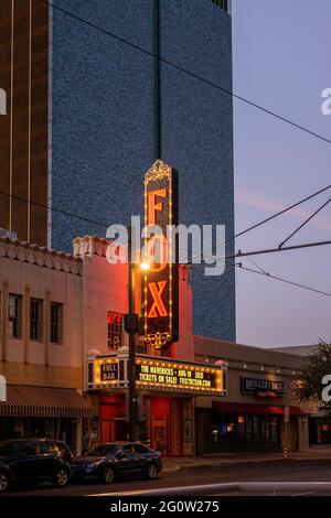 TUCSON, UNITED STATES - Jun 03, 2021: Fox Theater sign lit in red just after sunset. Arizona historic building in downtown Tucson, AZ Stock Photo