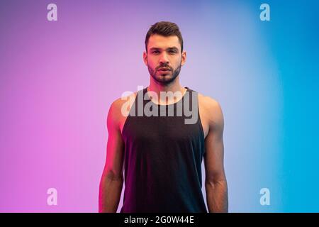 Confident european young man portrait in studio Stock Photo
