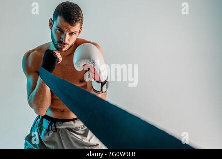 Boxer with boxing bandage and glove on hands Stock Photo