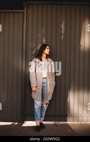 Portrait of transgender standing against wall in city Stock Photo