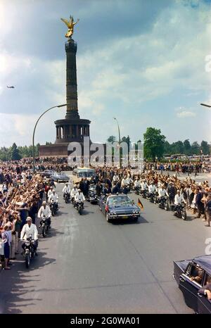 ST-C230-27-63      26 June 1963  Trip to Europe: Germany, West Berlin: President Kennedy in motorcade with Willy Brandt, Mayor of West Berlin and Konrad Adenauer, Chancellor of West Germany [Scratches are original to the negative.]  Please credit 'Cecil Stoughton. White House Photographs. John F. Kennedy Presidential Library and Museum, Boston' Stock Photo