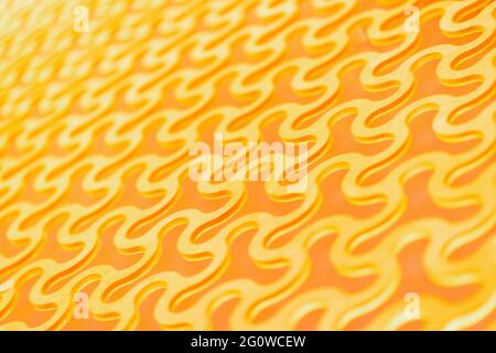 Abstract background, a repeating pattern of gold curved round cells in a gold lattice. Stock Photo