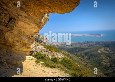 View of the Punta de la Banya of the Ebro delta, seen from the Foradada cave, in Serra de Montsià range (Tarragona, Catalonia, Spain) Stock Photo