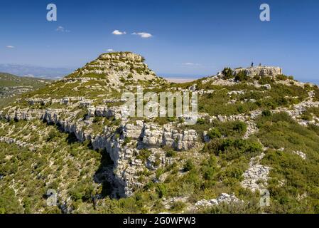 Views from the crest of the Serra de Montsià range looking towards the mountain and, in the background, the Ebro delta (Tarragona, Catalonia, Spain) Stock Photo