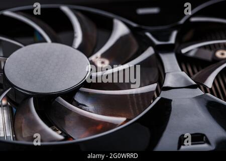 Game video card Cooler blades Selective close-up focus. Progressive cooling system for the video chip, processor and memory. Computer Details Stock Photo
