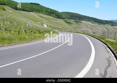 curvy main road into Mosel valley village Piesport Stock Photo