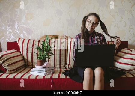 Nerd culture, nerdy and geeky things, finding solution, student, developer, programmer or computer geek woman. Cute nerd, geek, geeky, nerdy, dork Stock Photo