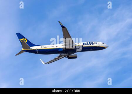 Ryanair (Malta Air) Boeing 737-8AS (Reg: 9H-QDC), one of several Maltese Registered Ryanair 737's departing runway 13. Stock Photo