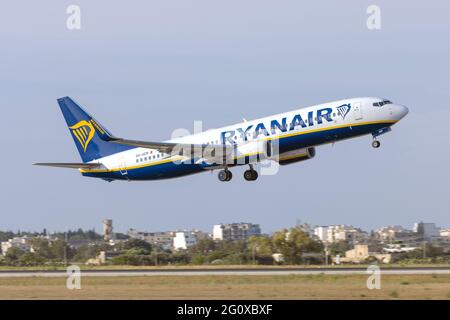Ryanair (Malta Air) Boeing 737-8AS (Reg: 9H-QEM), one of several Maltese Registered Ryanair 737's departing runway 13. Stock Photo