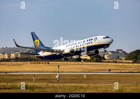 Ryanair (Malta Air) Boeing 737-8AS (Reg: 9H-QEM), one of several Maltese Registered Ryanair 737's departing runway 13. Stock Photo
