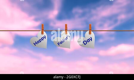 Happy Fathers Day Hanging In Heart shape. Pink clouds dramatic Sky. Words in pegs on a Rope Line. Fathers' day Greeting Creative Idea. Panorama Sky Stock Photo