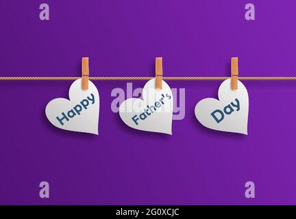 Happy Fathers Day Written In White Heart shape. Words hanging in pegs on a Rope. Fathers day Greeting Creative Ideas. Tags in Rope Pins With Violet Ba Stock Photo