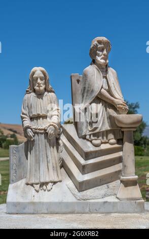 Santa Inez, CA, USA - April 3, 2009: San Lorenzo Seminary. Station of the Cross number 1 statue in white marble. Jesus is condemned to death. Under bl Stock Photo