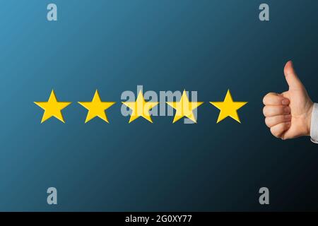 Customer indicating his full satisfaction with delivered service or product. Customer feedback. Stock Photo