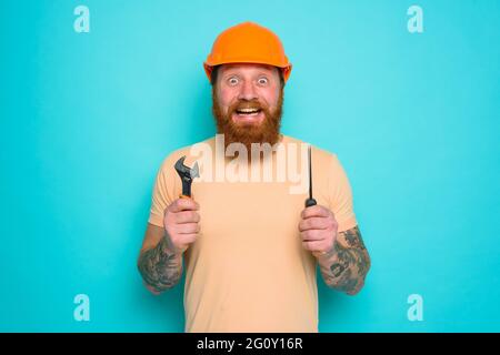 Incompetent worker is unsure and confused about his work Stock Photo