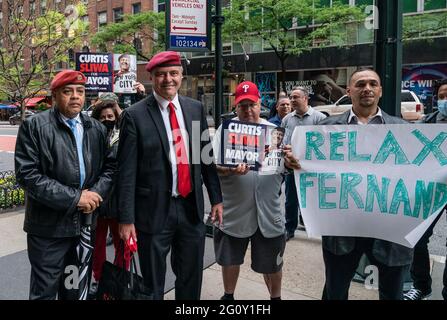 New York, United States. 03rd June, 2021. Mayoral candidate on Republican Party ticket Curtis Sliwa (in red tie) arrives for debate at PIX11 studios in New York on June 3, 2021. Sliwa was joined by supporters. (Photo by Lev Radin/Sipa USA) Credit: Sipa US/Alamy Live News