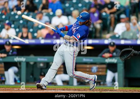 Texas Rangers catcher Jonah Heim reacts after striking out during