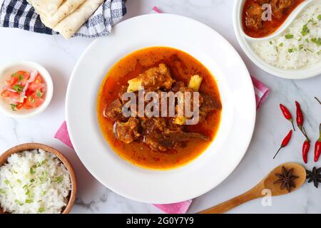 Shahi Mutton curry, Mutton masala, Mutton korma is a famous Spicy non-vegetarian dish of India. It's made out of Goat meat along with spices. Stock Photo