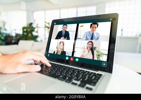 business team using laptop for a online meeting in video call Stock Photo