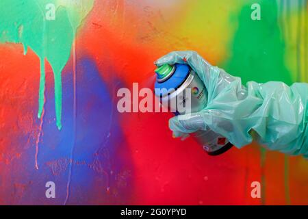Berlin, Germany. 03rd June, 2021. Using a spray can, paint is sprayed on a wall as part of a graffiti workshop. Credit: Gerald Matzka/dpa-Zentralbild/ZB/dpa/Alamy Live News Stock Photo