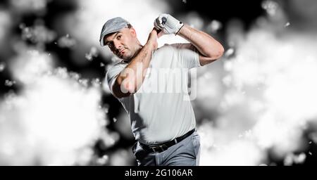 Composition of caucasian male golf player holding golf club over clouds on black background Stock Photo