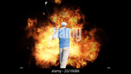 Composition of caucasian male golf player holding golf club over flames on black background Stock Photo