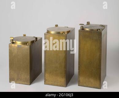 Powder Chest. Three brass gunpowder boxes of identical rectangular base but from different height. On top, they all have two eyes, placed in opposite angles, and the closure. The closures are always of a different type. The smallest coffin has labeled a double closure 1, the outer cover to open a hinge and is closed with a large screw; The inner edge is filled with an unknown plastic. The inside cover is loose and has a ring on top. The largest coffin has labeled a single lid 2, of the same type when the outer cover of the smallest casket and the inner edge also fed with plastic. The corstrel Stock Photo