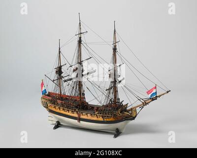 Model or a 38-gun frigate. Small decorative polychromed and witnessed block model. Eight and thirty pieces are arranged in a layer. Two levels: intermediate deck, lice pure and baking deck and semi-deck with running corridors. The sheek image is a crowned lion. Wrinkled mirror, hollow wulf with two gates, fence of a floor with carving of tendrils; Side galleries of a floor with fish tail. Straight stir with square roofing, steering wheel on the semi-deck. The model is equipped with two anchors, a double y-shaped chimney for the galley, a capstan in the pit, a lastep and a ship's bell. The seam Stock Photo