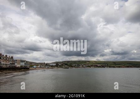 storm gathering over swanage on the dorset coast Stock Photo