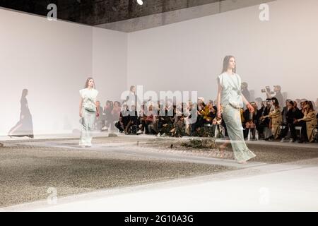 SYDNEY, AUSTRALIA - JUNE 04: Models on the Runway during the Christopher Esber show during Afterpay Australian Fashion Week 2021 Resort '22 Collections at Carriageworks on June 04, 2021 in Sydney, Australia. Stock Photo