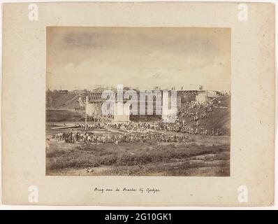 Bridge over the Brantas at Djadjar / near Kertesono; State railways on Java. The construction of the bridge over the Brantas at Djadjar and Kertesono. The workers pose for the construction project. Part of a group of 62 photos in a box with the inscription 'State Railways on Java' from 1888. Stock Photo