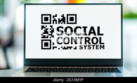 Laptop computer displaying the sign of Social Control System Stock Photo