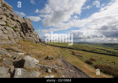 Windgather Rocks in High Peak, Derbyshire - a view from the foot of the escarpment looking north towards Macclesfield Forest. Stock Photo