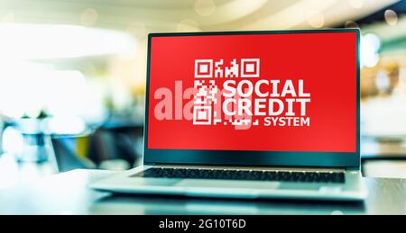 Laptop computer displaying the sign of Social Credit System Stock Photo