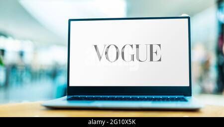 POZNAN, POL - MAY 15, 2021: Laptop computer displaying logo of Vogue, a fashion and lifestyle magazine Stock Photo